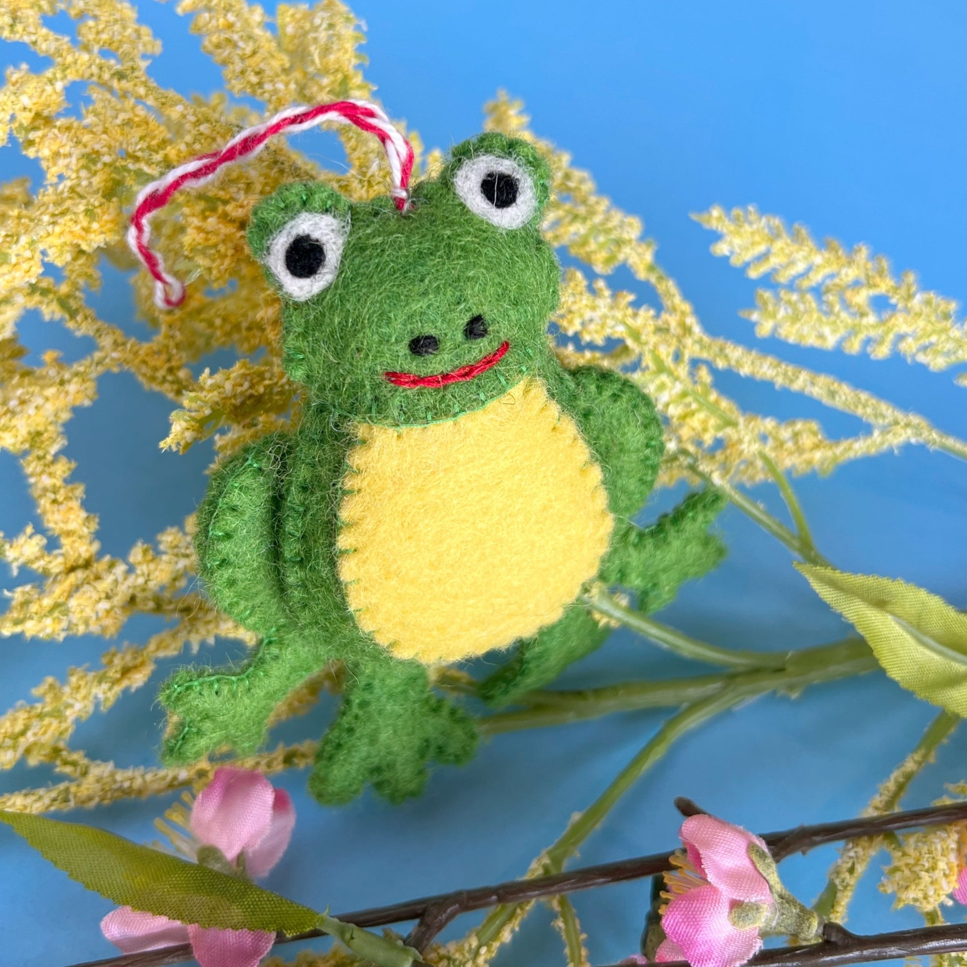 felt frog Christmas ornament styled for spring