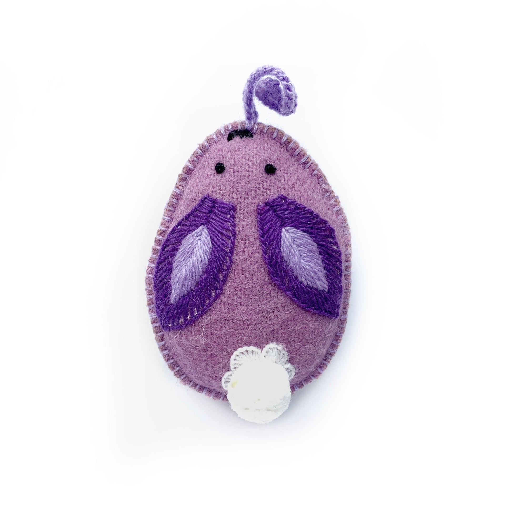 purple bunny egg Easter ornament with pom pom tail.