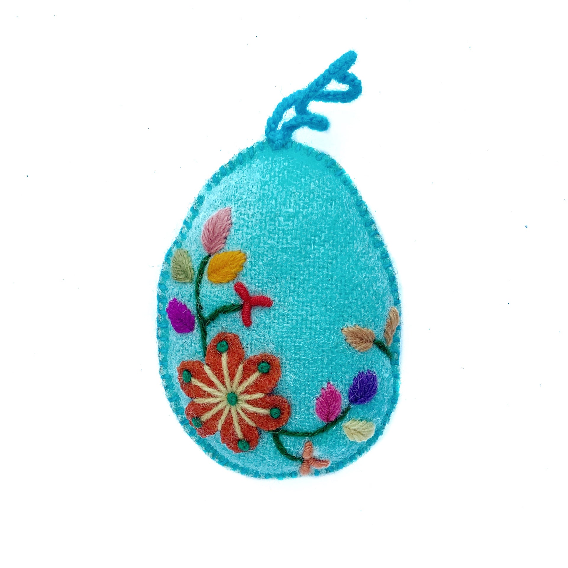 Soft blue pastel Easter egg ornament with hand embroidered flowers and designs.