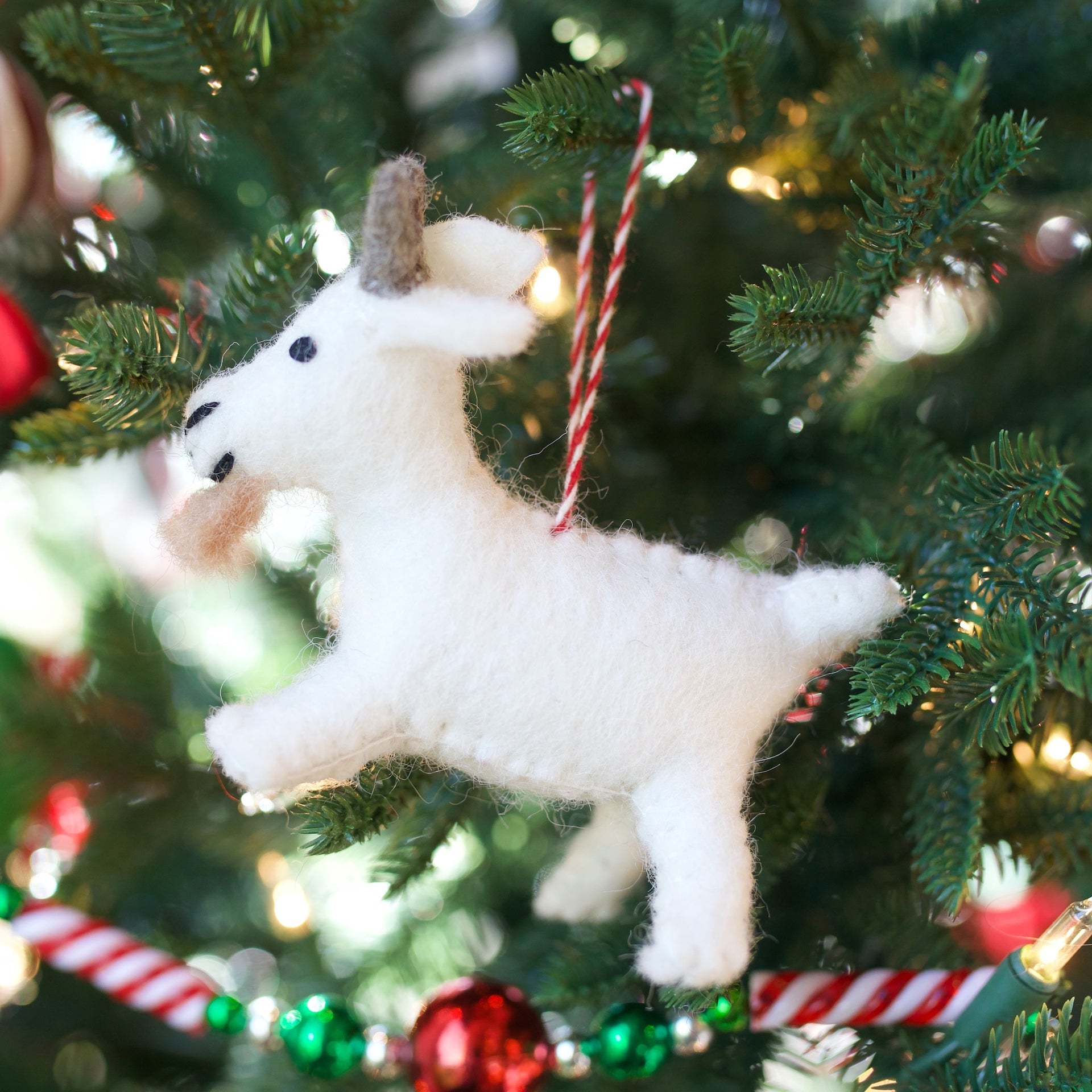 Goat Ornament hanging on Christmas Tree