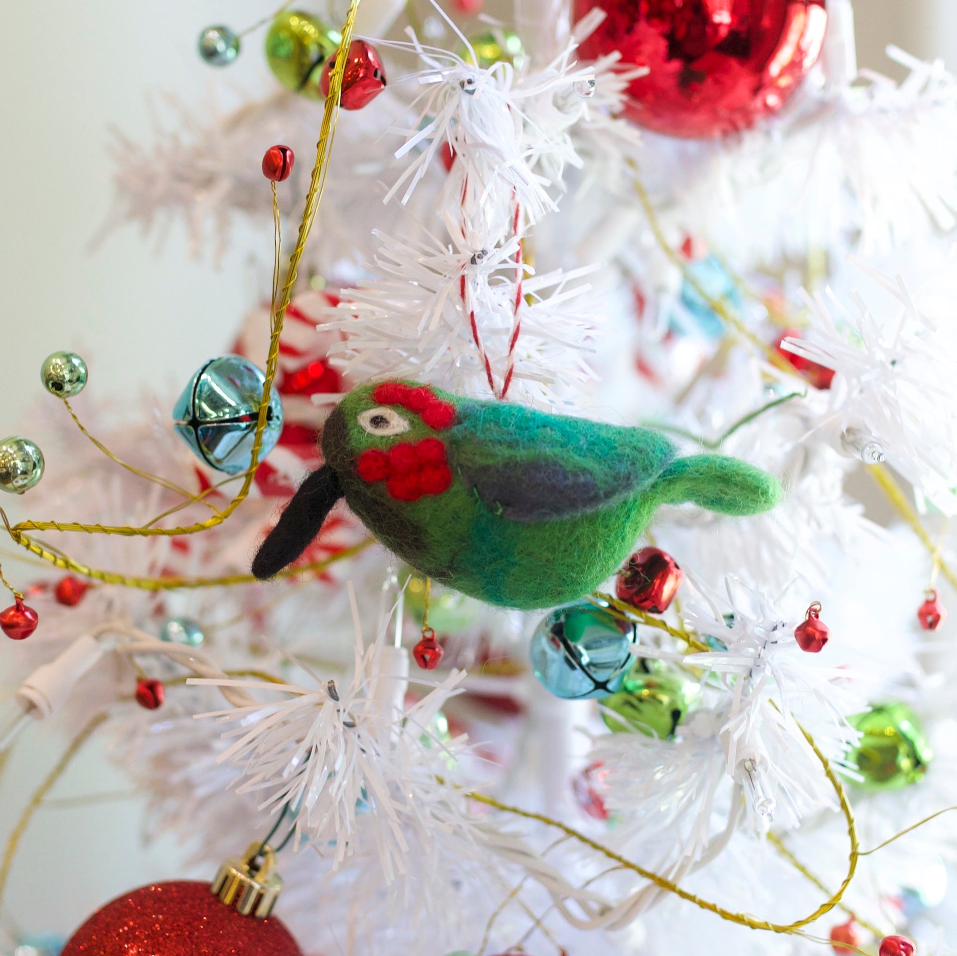 Hummingbird Christmas Ornament hanging on tree