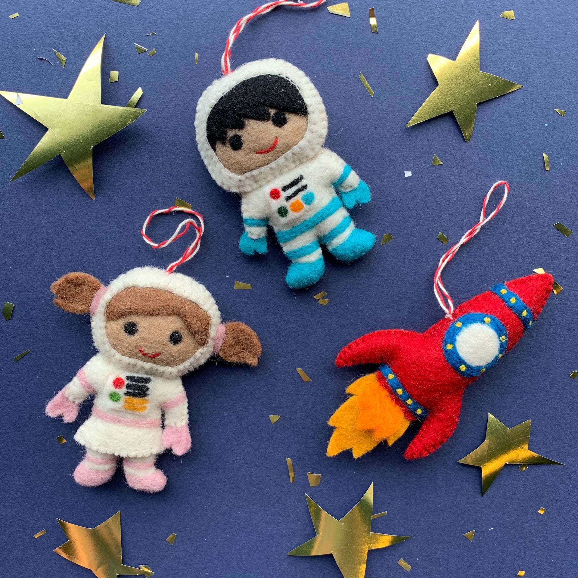 Rocket and  Kid Astronaut Space Christmas Ornaments made of felt wool by Ornaments 4 Orphans, a fair trade company.