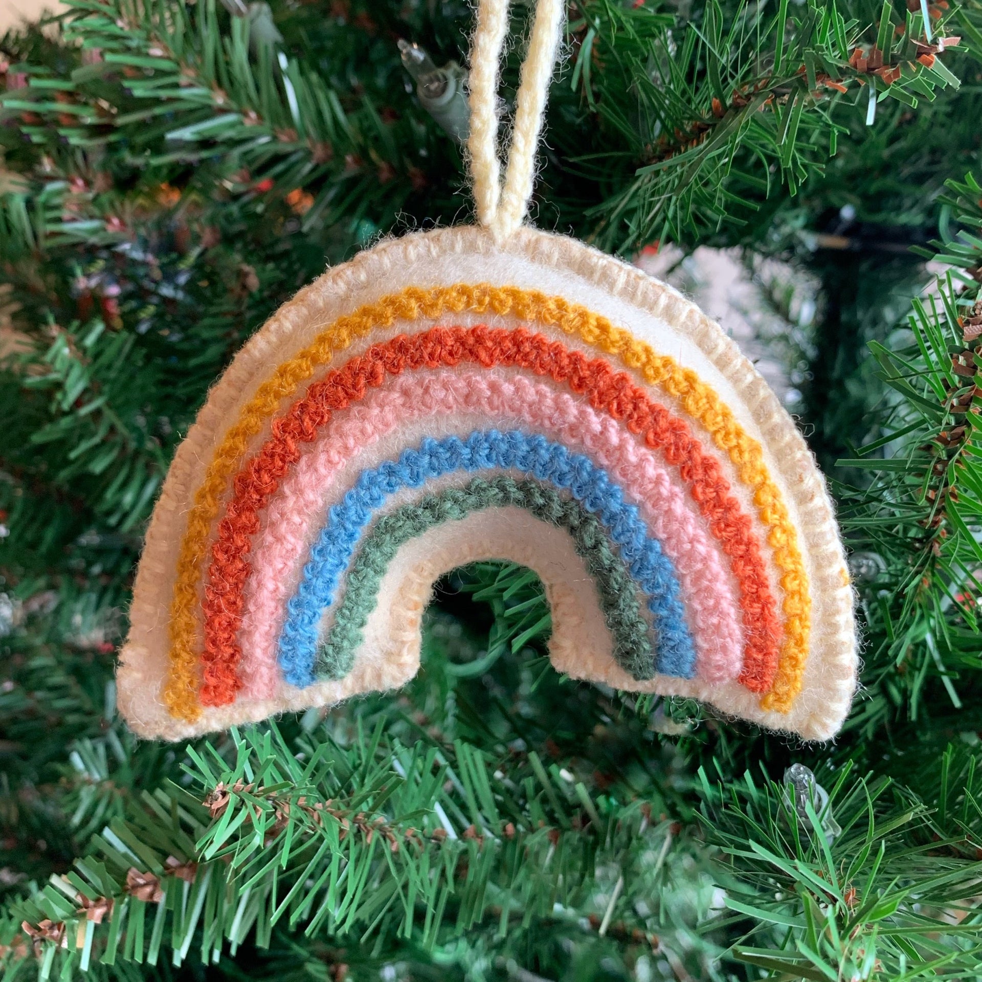 Pastel Rainbow Ornament hanging on Christmas tree