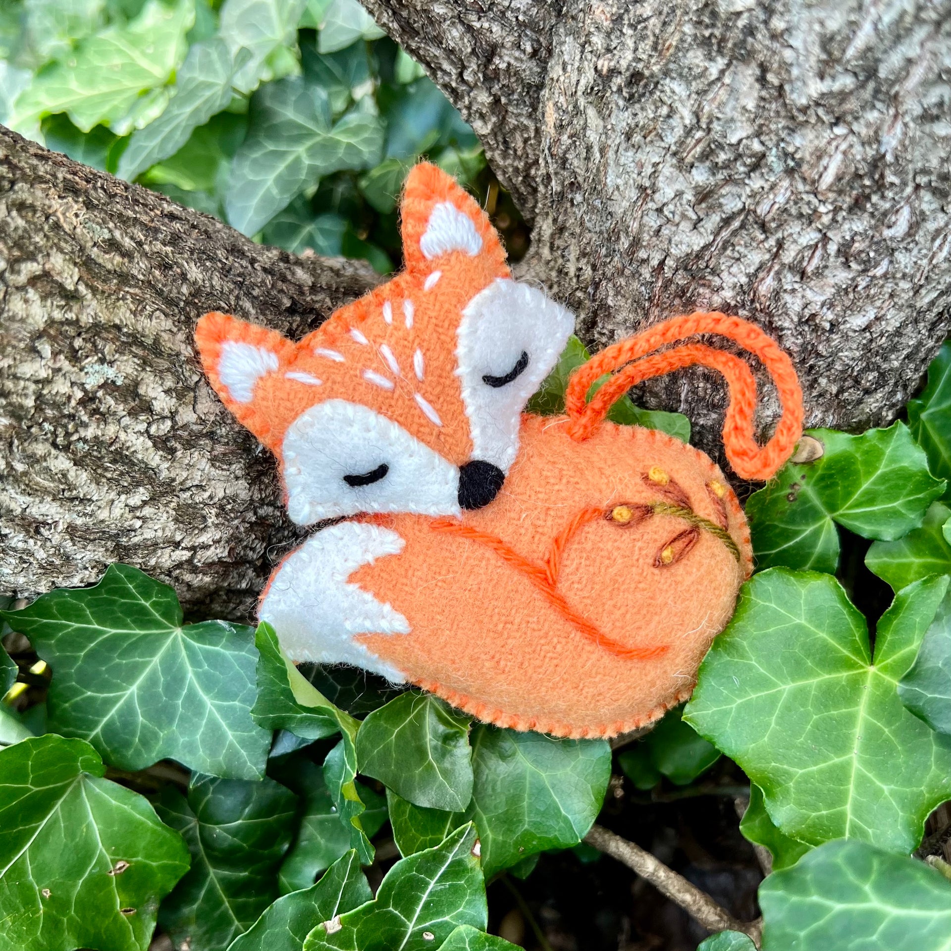 Fox Ornament Sleeping Outside in Woods