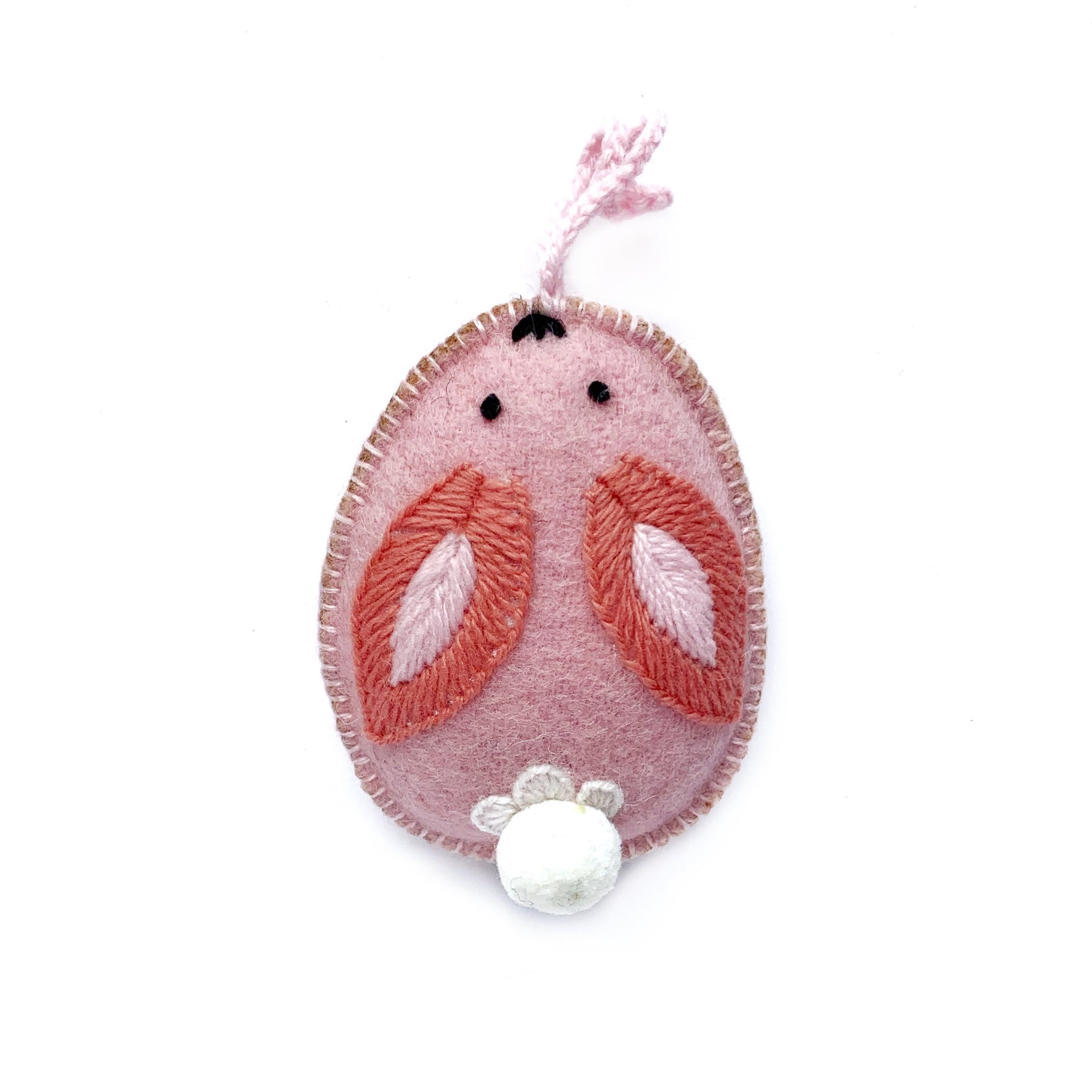 pink bunny egg Easter ornament with pom pom tail.