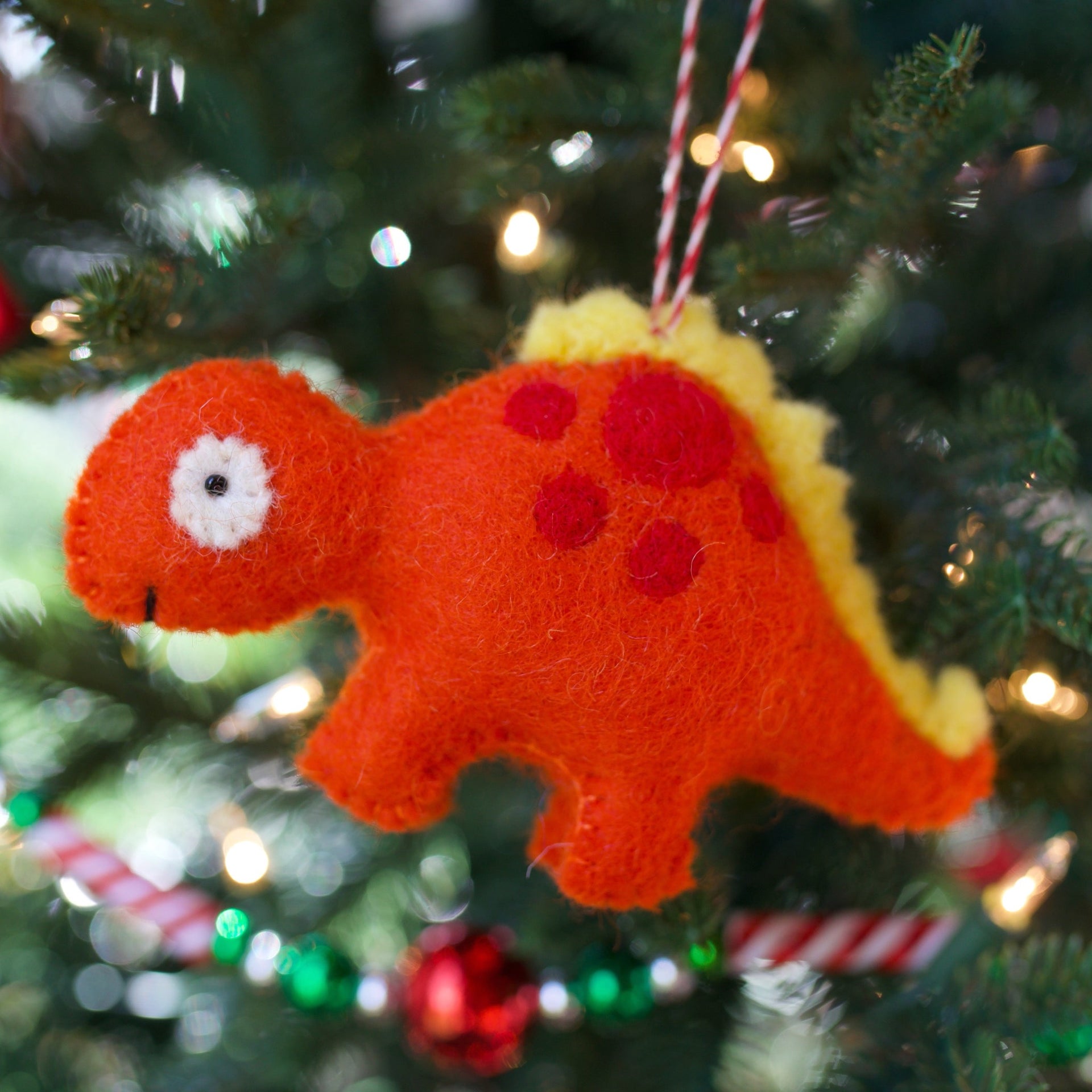 Orange Dinosaur Ornament on Christmas Tree