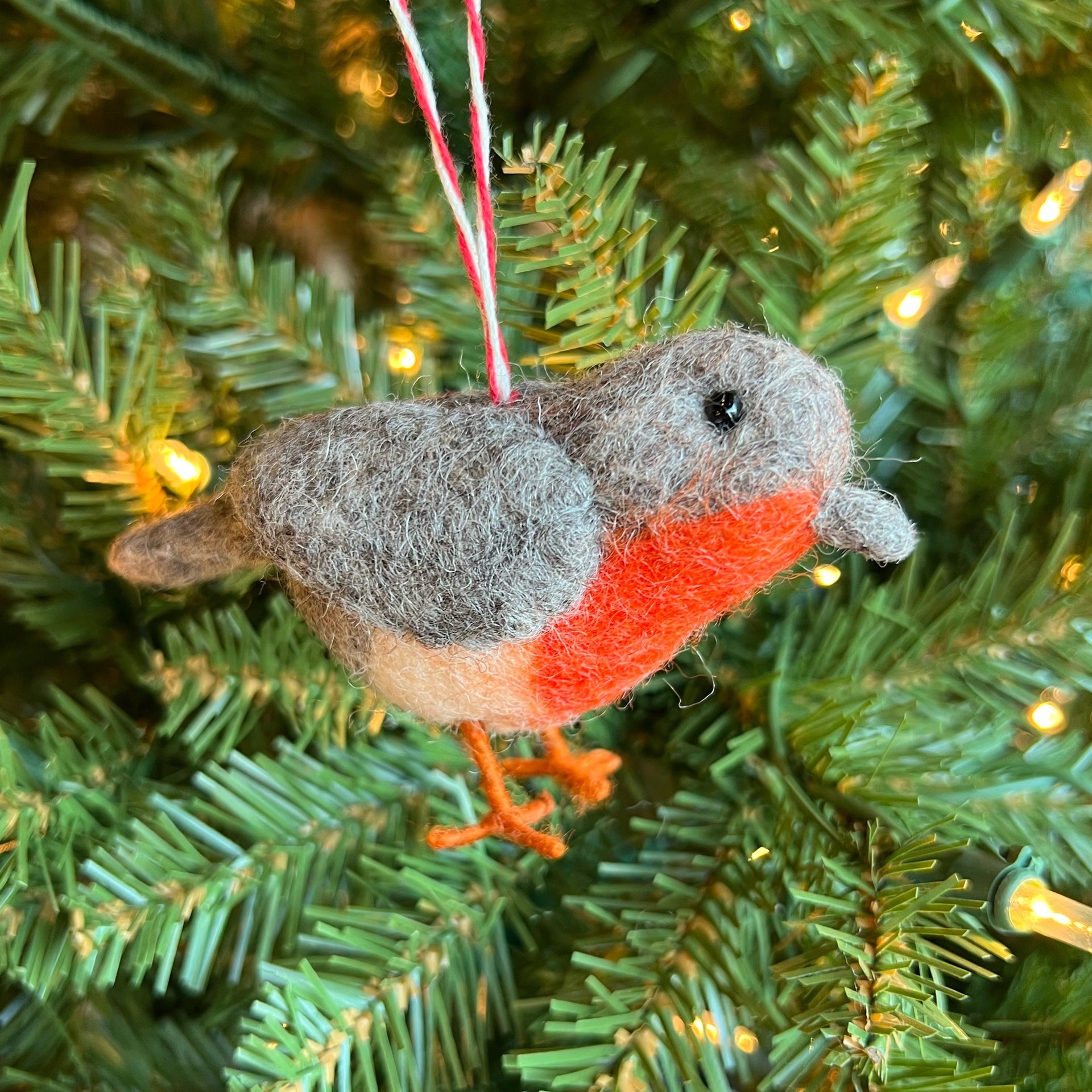 tufted wool robin ornament on Christmas tree