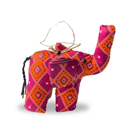 Stuffed Elephant Christmas ornament handmade from pink African kitenge fabric.